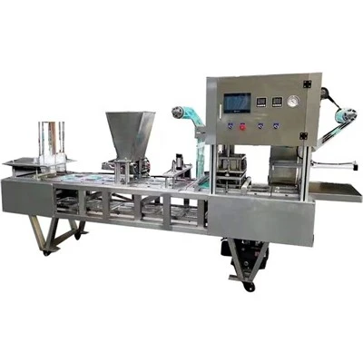 Machine de remplissage et de scellage de gobelets